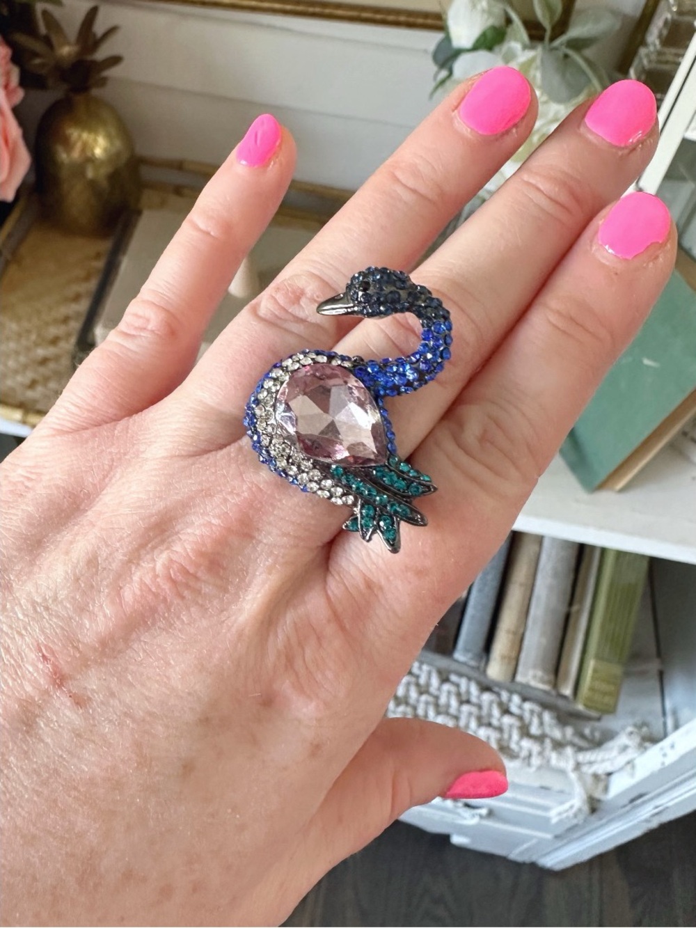 Swan Ring featuring a purple crystal center